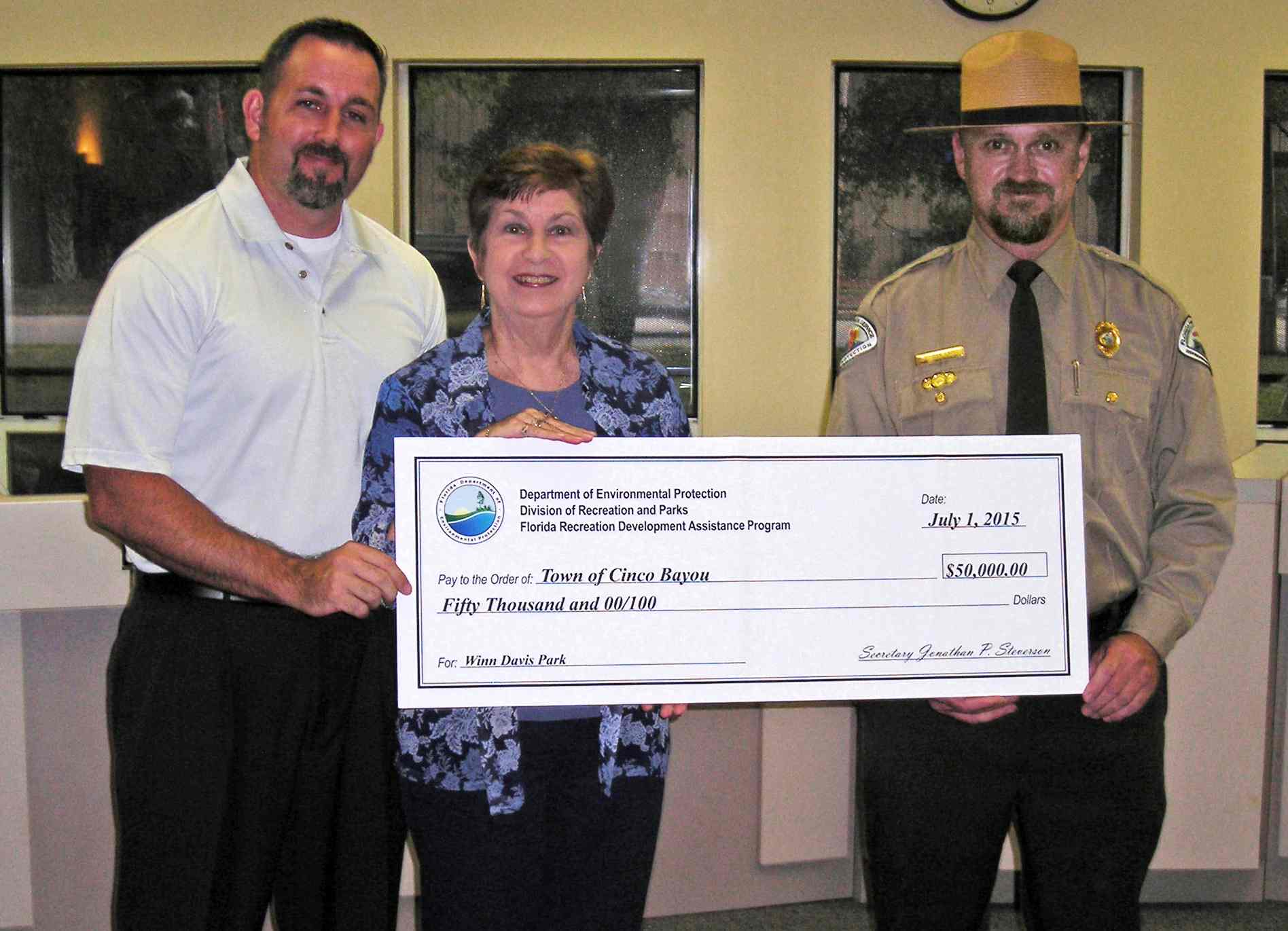 Mayor Jean Hood and Town Manager Keith Williams accepting the $50,000 FRDAP Grant from Mr. Daniel Laird of Florida Department of Environmental Protection